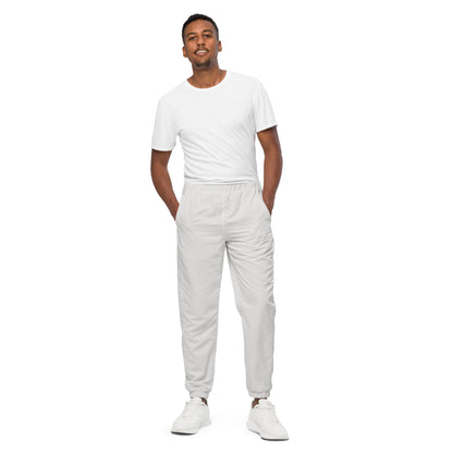 Unisex track pants Platinum worn by a model, featuring elastic cuffs and a lightweight, water-resistant design.