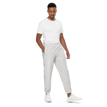 Unisex track pants in platinum color, featuring elastic cuffs and lightweight, water-resistant fabric for comfort.